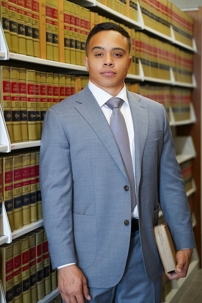Attorney Erik L Mullins in front of books